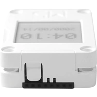 Ein kleines, rechteckiges elektronisches Gerät mit Display zeigt '04:10' und ein Datum. Es hat einen Anschluss an der Unterseite.